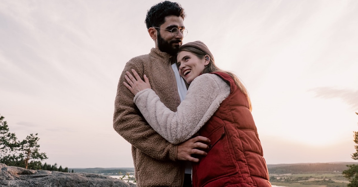 A man and a woman hugging