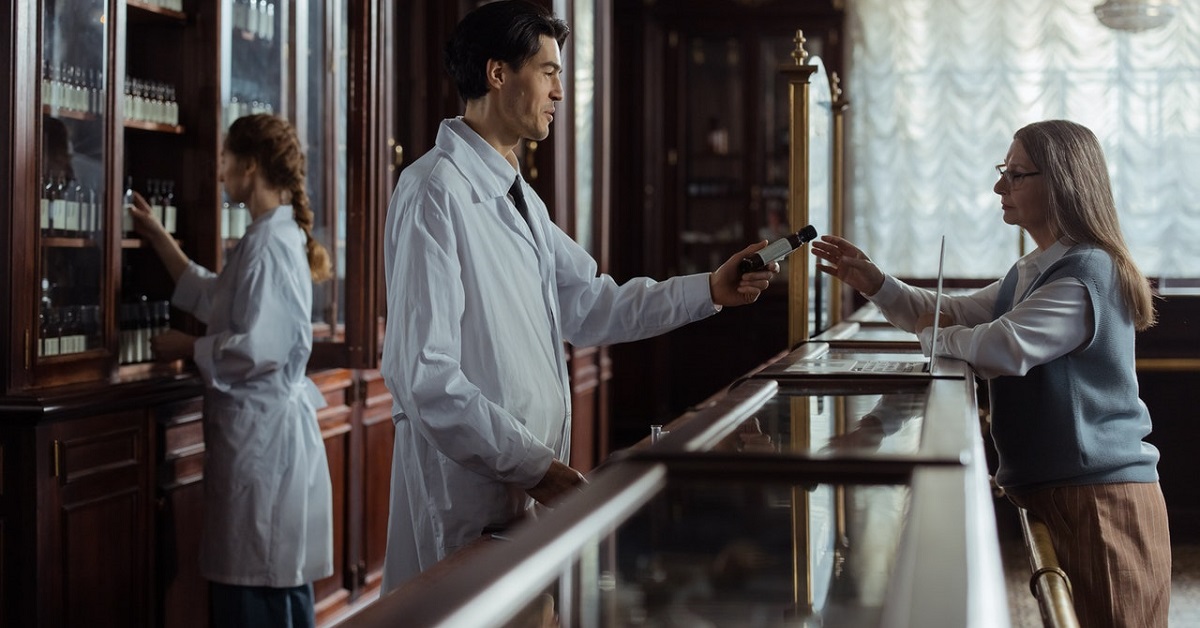 A pharmacist talking to a patient